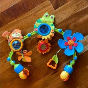 Tiny Love stroller or car seat busy toy station.